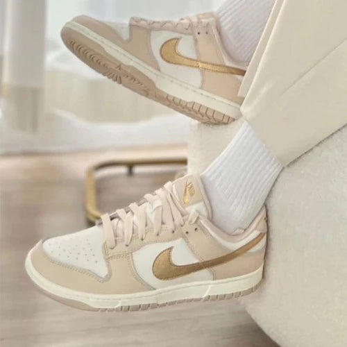 Gold swoosh top